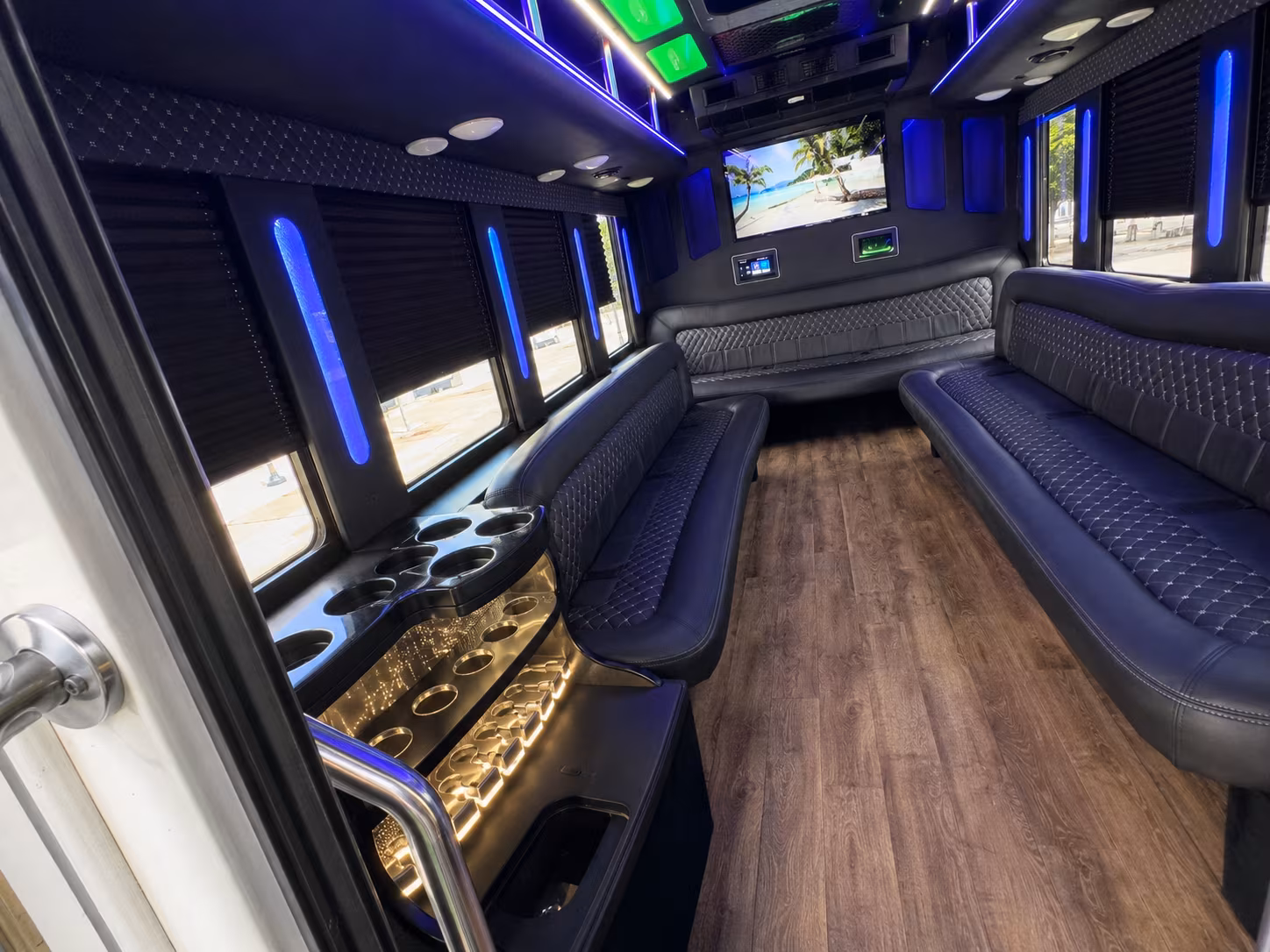 Wedding guests seated inside a party bus serving Santa Clara